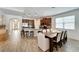 Open concept kitchen with breakfast bar and tile flooring at 12316 Juniper Field Ct, Riverview, FL 33579