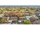 Aerial view of the condo complex with pool, landscaping, and parking at 12914 Fairway Dr # A, Hudson, FL 34667