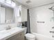 Updated bathroom featuring modern fixtures, shower/tub combo, and a vanity at 12914 Fairway Dr # A, Hudson, FL 34667