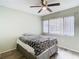 Bright and airy bedroom with large window, ceiling fan, and ample space at 12914 Fairway Dr # A, Hudson, FL 34667