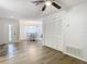 Hallway with double doors and view into dining area at 12914 Fairway Dr # A, Hudson, FL 34667