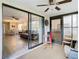 Screened porch with sliding glass doors leading to the living area at 12914 Fairway Dr # A, Hudson, FL 34667