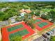 Multiple well-maintained community tennis courts at 12914 Fairway Dr # A, Hudson, FL 34667