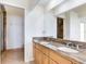 Double sink bathroom with granite countertop at 18120 Wayne Rd, Odessa, FL 33556