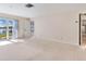 Large bedroom with access to lake views and additional rooms at 18120 Wayne Rd, Odessa, FL 33556