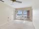 Bedroom with lake view and built-in shelving at 18120 Wayne Rd, Odessa, FL 33556