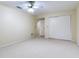 Bedroom with double door closet and ceiling fan at 18120 Wayne Rd, Odessa, FL 33556