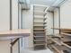 Walk-in closet with custom shelving at 18120 Wayne Rd, Odessa, FL 33556