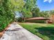 Long private driveway leading to home at 18120 Wayne Rd, Odessa, FL 33556