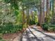 Long driveway, lined with trees, leading to home at 18120 Wayne Rd, Odessa, FL 33556