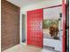Open red double doors leading inside at 18120 Wayne Rd, Odessa, FL 33556