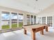 Game room with pool table,water views and high ceilings at 18120 Wayne Rd, Odessa, FL 33556