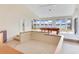 Sunlit game room showcasing a pool table and access to outdoor areas at 18120 Wayne Rd, Odessa, FL 33556