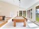 Game room featuring a pool table and vaulted ceilings at 18120 Wayne Rd, Odessa, FL 33556