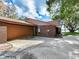 Brick garage with double door and large driveway at 18120 Wayne Rd, Odessa, FL 33556