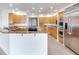 Bright kitchen with stainless steel appliances, and granite countertops at 18120 Wayne Rd, Odessa, FL 33556