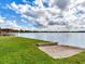 Expansive lakefront view with private dock and boat ramp access at 18120 Wayne Rd, Odessa, FL 33556