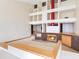 Open-concept living room featuring a fireplace and a unique architectural design at 18120 Wayne Rd, Odessa, FL 33556