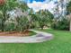 Curving walkway through lush landscaping at 18120 Wayne Rd, Odessa, FL 33556