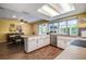 Bright kitchen includes modern appliances, ample counter space, and a sunlit breakfast area at 2993 W Vina Del Mar Blvd, St Pete Beach, FL 33706