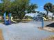 Community playground with colorful play structures, slides, and climbing equipment for children at 2993 W Vina Del Mar Blvd, St Pete Beach, FL 33706