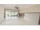 Living room undergoing renovations with exposed walls and new flooring at 417 Boca Ciega Point N Blvd # 417, St Petersburg, FL 33708