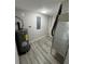 Compact laundry room with updated appliances and ample storage at 5038 Galaxy Dr, New Port Richey, FL 34652