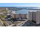Aerial view of a waterfront residential complex with parking and surrounding buildings at 5130 Brittany S Dr # 505, St Petersburg, FL 33715