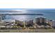 Aerial view of two high-rise buildings near a tranquil body of water at 5130 Brittany S Dr # 505, St Petersburg, FL 33715
