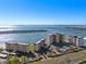 Elevated perspective of a waterfront residential area with several buildings at 5130 Brittany S Dr # 505, St Petersburg, FL 33715