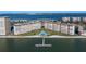 High-rise condos overlooking the water with a private dock and lush landscaping at 5130 Brittany S Dr # 505, St Petersburg, FL 33715