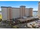 Aerial perspective of a residential building with parking and a waterfront view at 5130 Brittany S Dr # 505, St Petersburg, FL 33715