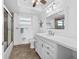 Bathroom with white vanity, shower/tub combo, and tiled flooring at 5130 Brittany S Dr # 505, St Petersburg, FL 33715