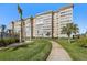 View of the condominium building from the landscaped grounds at 5130 Brittany S Dr # 505, St Petersburg, FL 33715