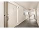 Apartment hallway with unit 505 door and exit sign at 5130 Brittany S Dr # 505, St Petersburg, FL 33715