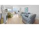 Inviting living room with comfortable seating, natural light, and water views at 5130 Brittany S Dr # 505, St Petersburg, FL 33715