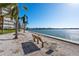 Waterfront with a bench, perfect for enjoying scenic views at 5130 Brittany S Dr # 505, St Petersburg, FL 33715