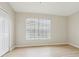 Bright bedroom with large window and light flooring at 18860 Duquesne Dr, Tampa, FL 33647