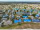 Elevated view of a golf course community with water features at 2701 Lancaster Dr, Sun City Center, FL 33573