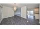 Open concept dining room with tile floor, chandelier, and view to the kitchen at 2701 Lancaster Dr, Sun City Center, FL 33573