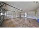 Garage interior with storage cabinets and garage door opener at 2701 Lancaster Dr, Sun City Center, FL 33573