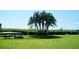 Peaceful waterfront lawn with picnic table at 413 S Bayshore Blvd # 1, Safety Harbor, FL 34695