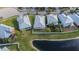Aerial view of houses, showcasing backyard and canal views at 442 Bahama Grande Blvd, Apollo Beach, FL 33572