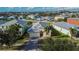 An aerial view of a single-Gathering home with a metal roof at 442 Bahama Grande Blvd, Apollo Beach, FL 33572