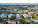 Aerial photo showing a neighborhood of houses with a pond at 442 Bahama Grande Blvd, Apollo Beach, FL 33572