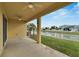 Covered patio overlooking a canal and neighborhood at 442 Bahama Grande Blvd, Apollo Beach, FL 33572