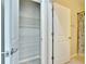 Linen closet with wire shelving, ideal for storage at 442 Bahama Grande Blvd, Apollo Beach, FL 33572