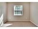 Well-lit bedroom featuring a window with blinds at 442 Bahama Grande Blvd, Apollo Beach, FL 33572