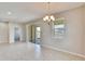Bright dining room with sliding glass doors to patio at 442 Bahama Grande Blvd, Apollo Beach, FL 33572