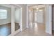 Bright and spacious entryway with tile flooring and access to other rooms at 442 Bahama Grande Blvd, Apollo Beach, FL 33572